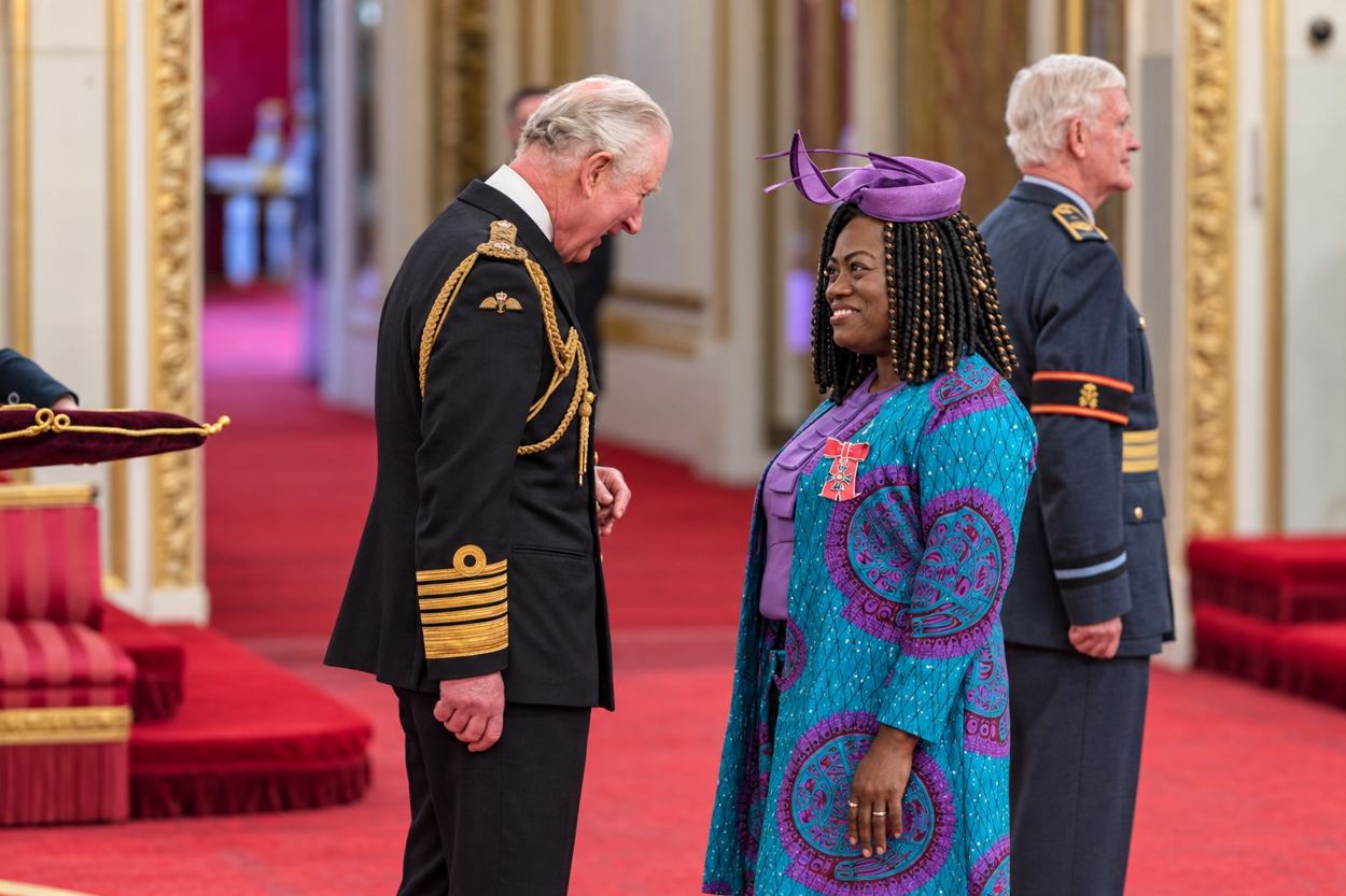 Dreda Say Mitchell with King Charles III at her investiture