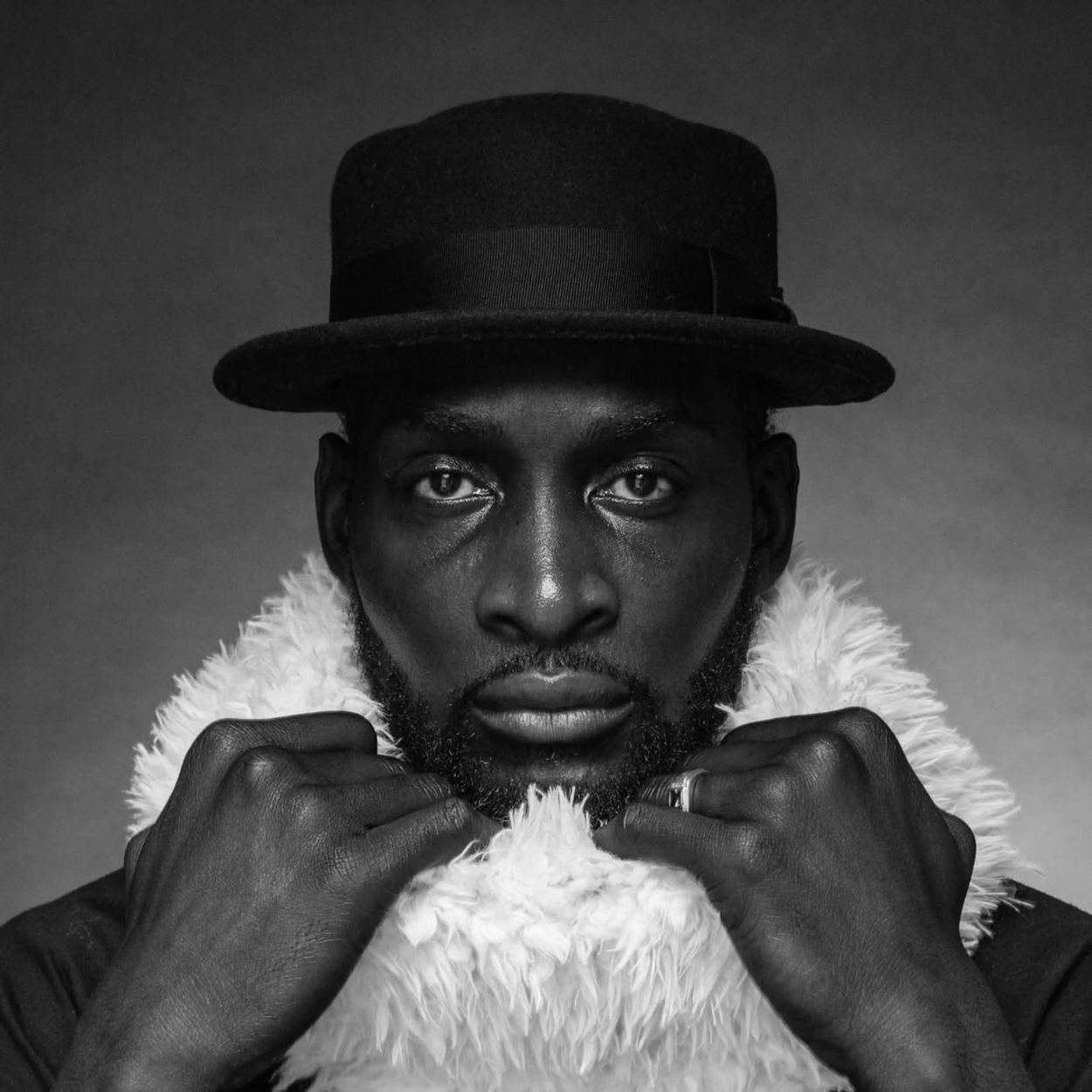 Kenrick Sandy in a black and white portrait